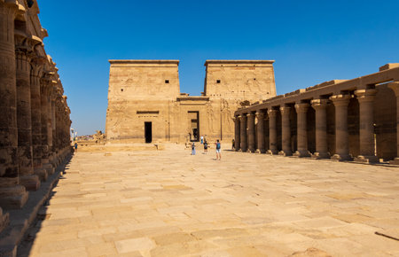Front view of the reconstructed Philae Temple on an island in Aswan Harbor or Reservoir formed by the Low Dam on the Nileの写真素材