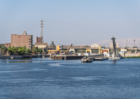 Approaching the new Esna dam and lock on Nile River with gates open for entryの写真素材
