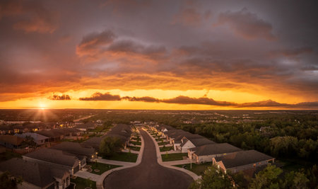 Aerial view of a dramatic sunset lighting clouds before severe thunderstorm near Georgetown Texasの写真素材