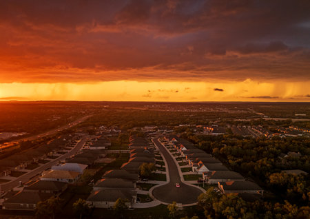 Aerial view of a dramatic sunset lighting clouds before thunderstorm near Georgetown Texasの写真素材