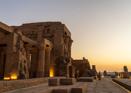 Magnificent temple of Sobek and Horus at Kom Ombo as the sun sets over the river Nileの写真素材