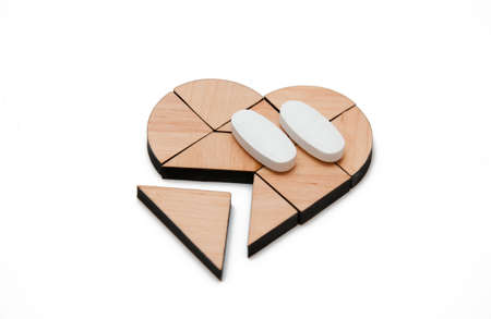 white tablets near the heartの写真素材