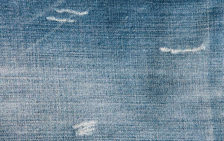 Denim materyal sinogo background, with a few scrapesの写真素材