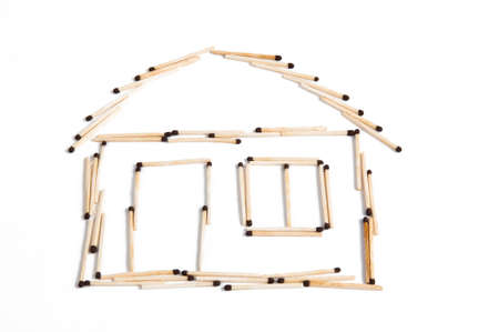 pile of wooden matches on a white backgroundの写真素材