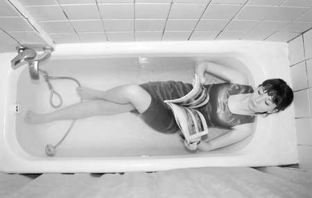 girl in the bathroom, black and whiteの写真素材