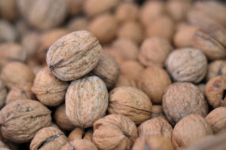 a large pile of walnuts