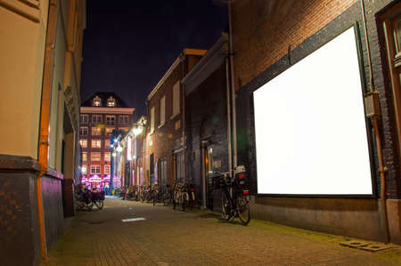narrow streets of Amsterdam at nightの写真素材