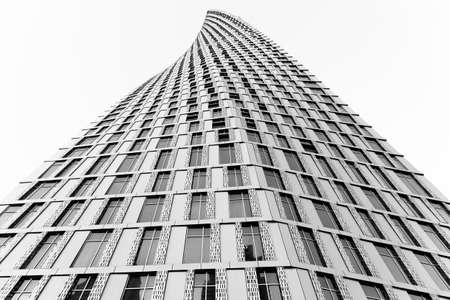 DUBAI, UAE - 3 MARCH, 2014: Twisted modern building in Dubai Marina. Elite residential area in...