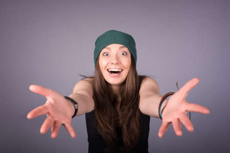happy girl on a gray backgroundの写真素材