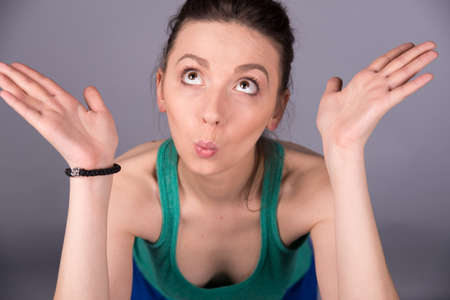 pretty woman on a gray backgroundの写真素材