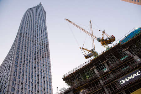 DUBAI, UAE - 3 MARCH, 2014: Twisted modern building in Dubai Marina. Elite residential area in...