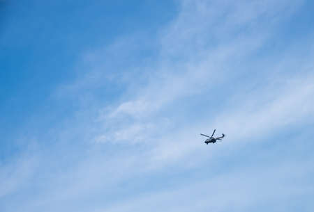 helicopter flying in the blue skyの写真素材