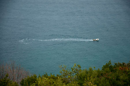lone boat sails along the Bosphorus