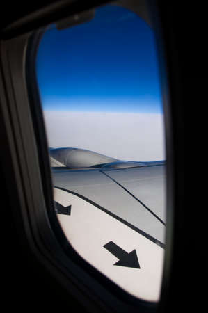 wing of airplane - view through the windowの写真素材