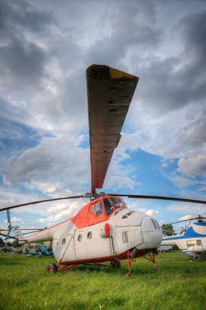 old helicopter on parking
