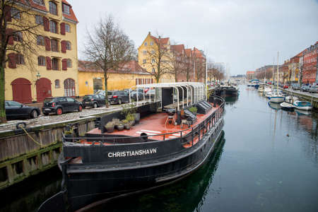 COPENHAGEN, DENMARK - 30 DECEMBER, 2014: One of the many canals in the city center. December 30, 2014 Copenhagen, Denmark.のeditorial素材
