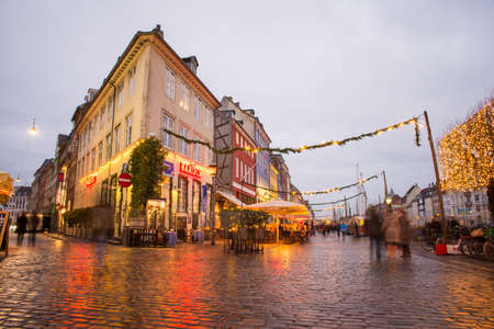 COPENHAGEN, DENMARK - 30 DECEMBER, 2014: Nyhavn is a 17th-century waterfront, canal and entertainment district in Copenhagen, Denmark. December 30, 2014 Copenhagen, Denmark.のeditorial素材