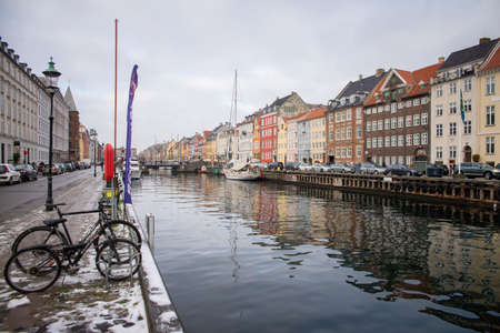 COPENHAGEN, DENMARK - 30 DECEMBER, 2014: Nyhavn is a 17th-century waterfront, canal and entertainment district in Copenhagen, Denmark. December 30, 2014 Copenhagen, Denmark.のeditorial素材