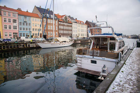 COPENHAGEN, DENMARK - 30 DECEMBER, 2014: Nyhavn is a 17th-century waterfront, canal and...