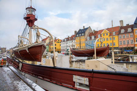 COPENHAGEN, DENMARK - 30 DECEMBER, 2014: Nyhavn is a 17th-century waterfront, canal and entertainment district in Copenhagen, Denmark. December 30, 2014 Copenhagen, Denmark.のeditorial素材