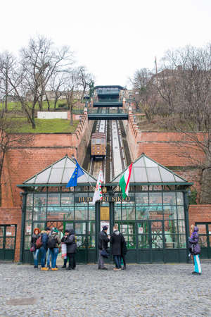 BUDAPEST, HUNGARY - MARCH 12, 2015: Tourists waiting for landing on the Budapest Castle Hill Funicular is a funicular railway in the city. March 12, 2015. Budapest, Hungary.のeditorial素材