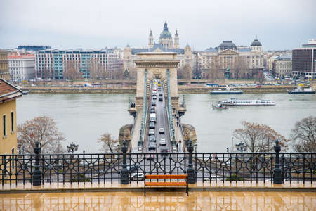 BUDAPEST, HUNGARY - MARCH 12, 2015: The Chain Bridge is a suspension bridge that spans the River Danube between Buda and Pest, the western and eastern sides of Budapest. March 12, 2015. Budapest, Hungary.のeditorial素材