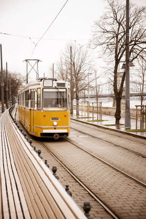 old yellow tram in Budapestの写真素材