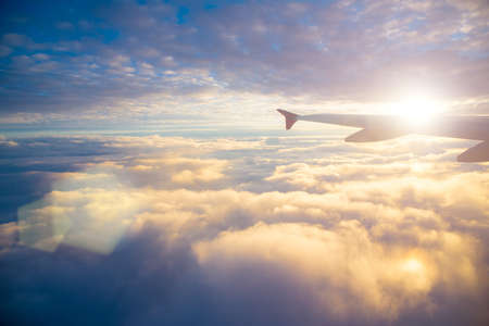 view from the airplane window at the sky