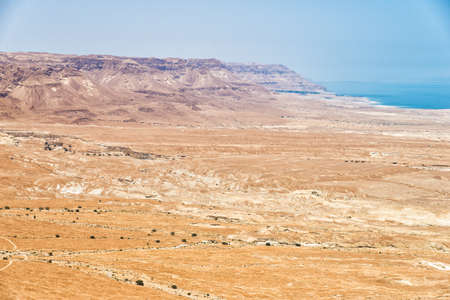 Top view from Masada fortress to the Judaean desert and the Dead Seaの写真素材