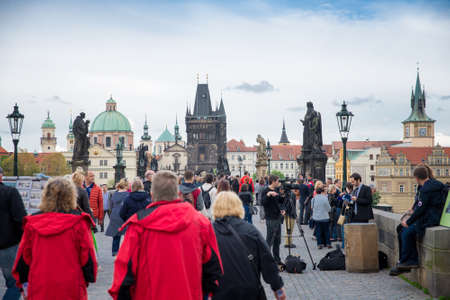 PRAGUE, CZECH REPUBLIC - MAY 6, 2015: The popular tourist itinerary in Prague on the Charles Bridge. May 6, 2015. Prague, Czech Republic.のeditorial素材