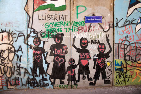 BETHLEHEM, PALESTINE - JUNE 2, 2015: The Israeli West Bank barrier  is a separation barrier. Upon completion, its total length will be about 700 kilometres. June 2, 2015. Bethlehem, Palestine.のeditorial素材