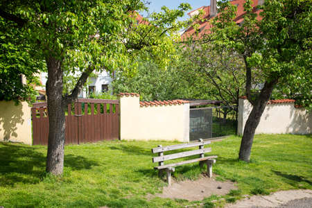 bench in a beautiful garden in Pragueの写真素材