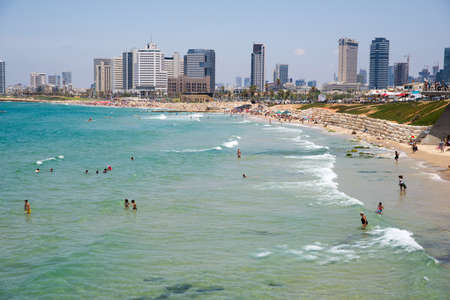 TEL AVIV, ISRAEL - JUNE 4, 2015: People relax on a beautiful beach in Tel Avivのeditorial素材