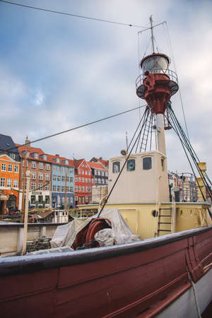 COPENHAGEN, DENMARK - 30 DECEMBER, 2014: Nyhavn is a 17th-century waterfront, canal and...