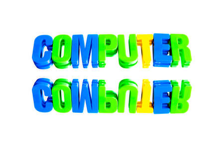 word computer from plastic letters on a white background