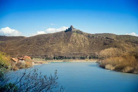 view of the Church from the river bank in Mtskhetaの写真素材