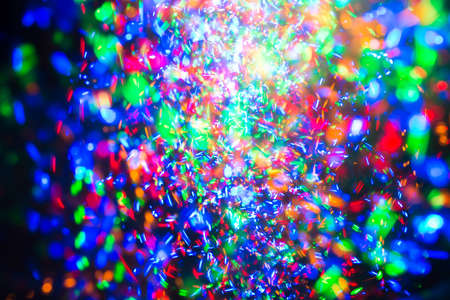 abstract background of colored lights on a dark backgroundの写真素材