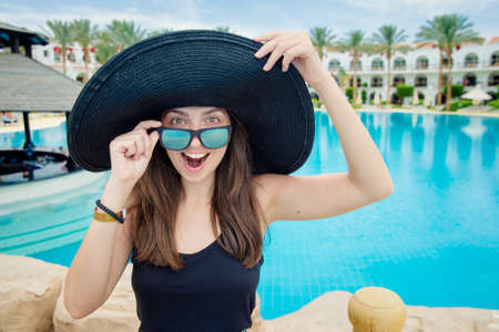 happy girl in a hatの写真素材