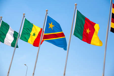 Many different flags against the skyの写真素材