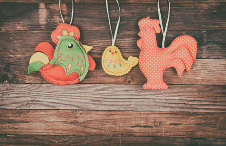 the  chicken family on the wooden backgroundの写真素材