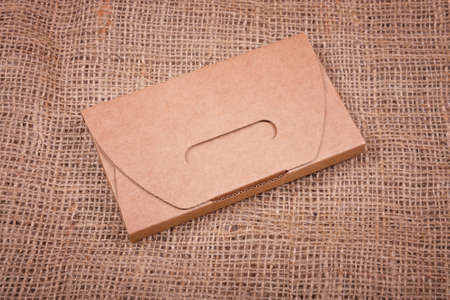paper envelope on fabric background