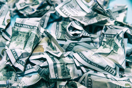 a lot of crumpled dollarsの写真素材