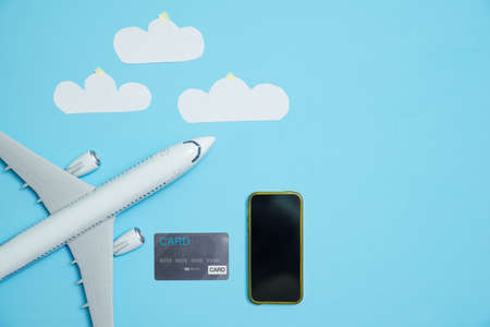 things for travel and airplane on the blue background