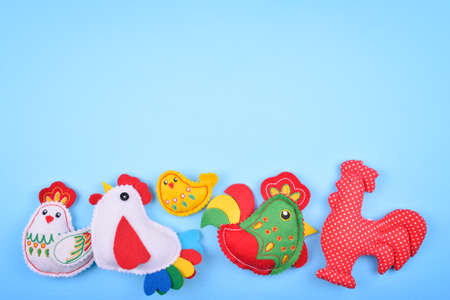 the  chicken family on the blue background