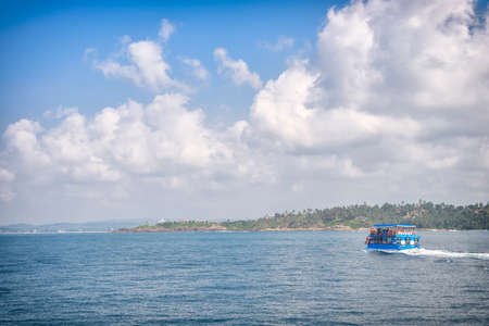 Ship with tourists watching the whalesの写真素材
