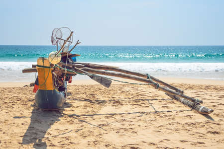 fishing boat on the ocean shoreの写真素材