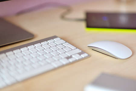 mouse and keyboard on the wooden tableの写真素材