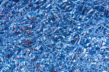 crumpled foil as an abstract backgroundの写真素材