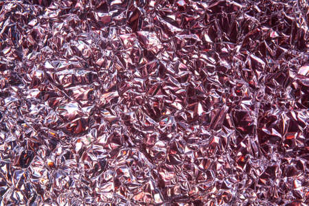 crumpled foil as an abstract backgroundの写真素材