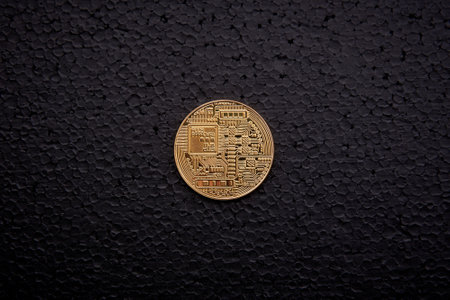 golden coin bitcoin on black backgroundの写真素材